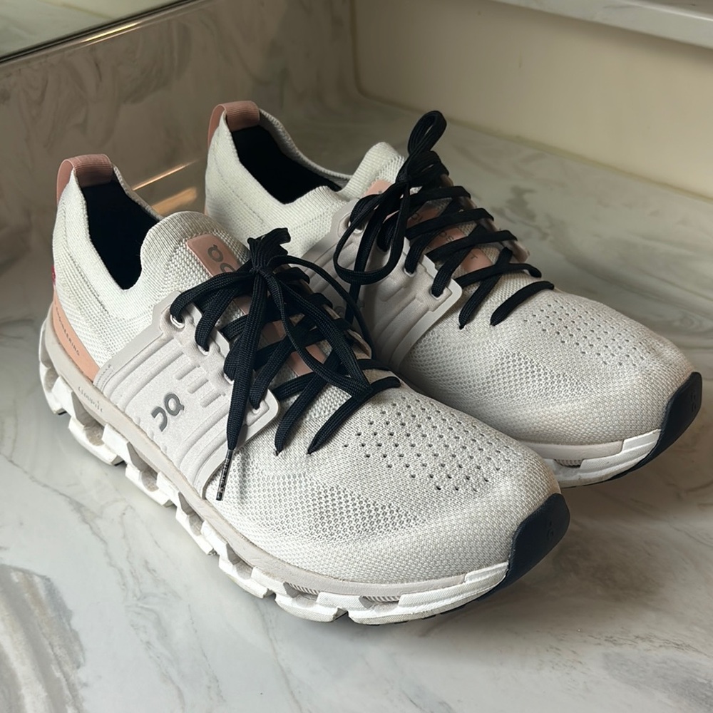 On Running White and Pink Sneakers